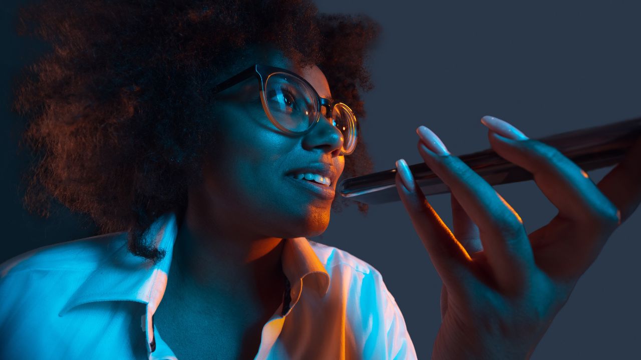 Master SEO for Coach Website: Quick Visibility Tips  woman holding phone to search
