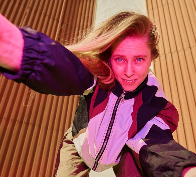 Confident female coach looking directly at the camera, representing how a custom website builds trust with coaching clients Confident female coach looking directly at the camera, representing how a custom website builds trust with coaching clients